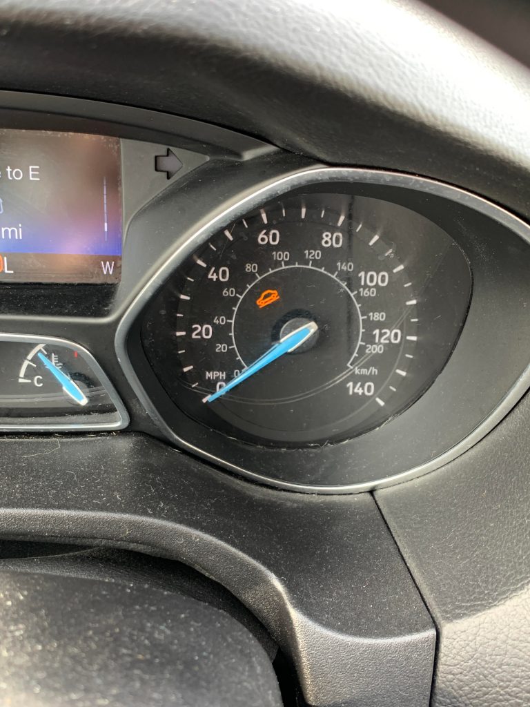 Car Going Downhill Light on Dash