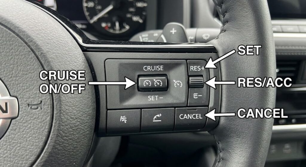 Nissan Rogue steering wheel cruise control buttons labeled — showing exact location of SET, RES, and CANCEL controls