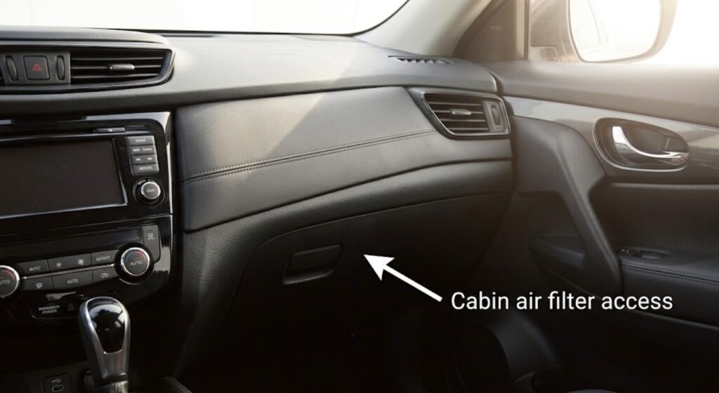 2017 Nissan Rogue glove box closed — cabin air filter is accessed from behind this panel on the passenger side