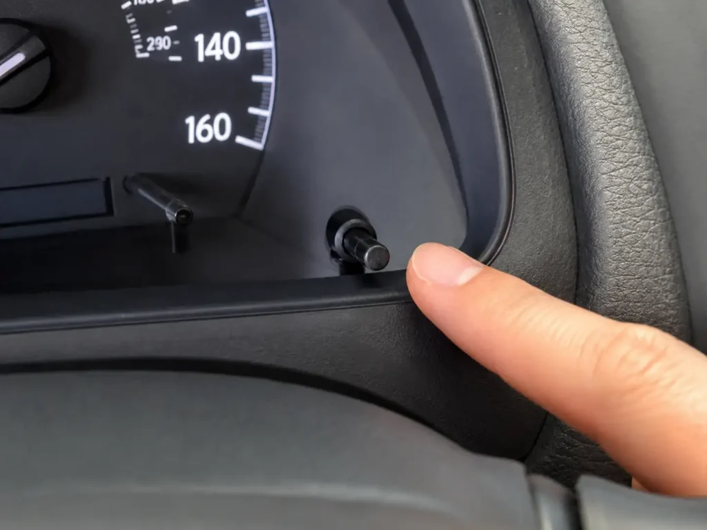 Toyota Camry trip meter reset button on dashboard 
