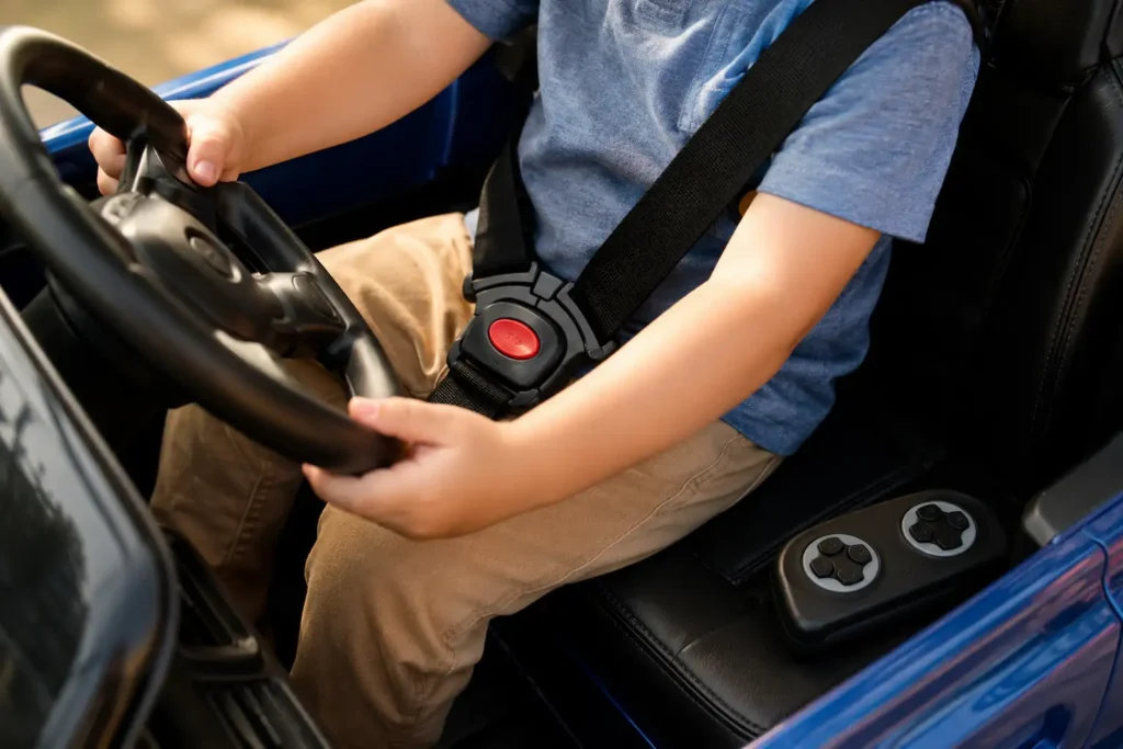 Safety harness and parent remote control on a kids 2 seater electric ride on car